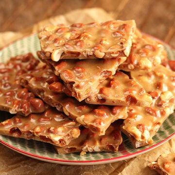 Pieces of Peanut Brittle on serving dish