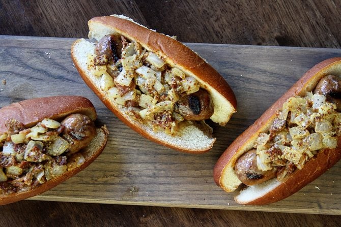 This Warm Bacon Onion Relish will elevate your brats and dogs and will make you king of the grill this summer! 