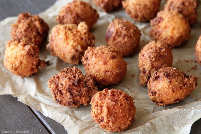 These Pimiento Cheese Hush Puppies need to be on your MUST MAKE list! The tangy pimiento and gooey cheese take the ordinary to extraordinary! 
