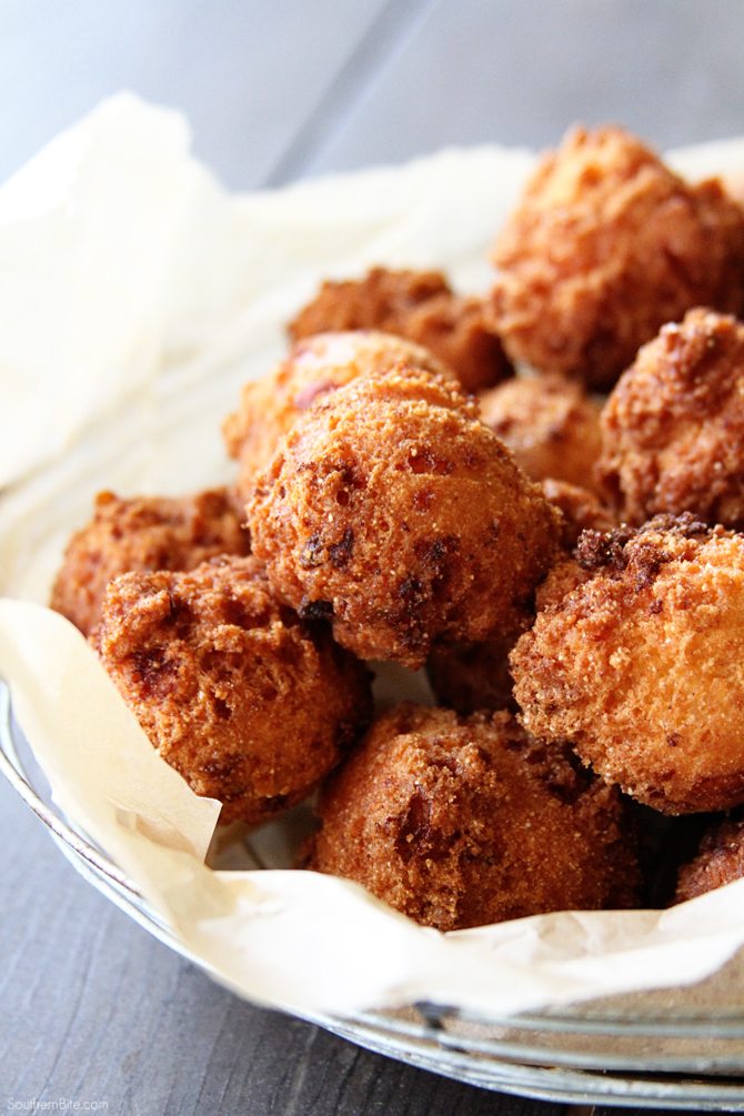 These Pimiento Cheese Hush Puppies need to be on your MUST MAKE list! The tangy pimiento and gooey cheese take the ordinary to extraordinary! 