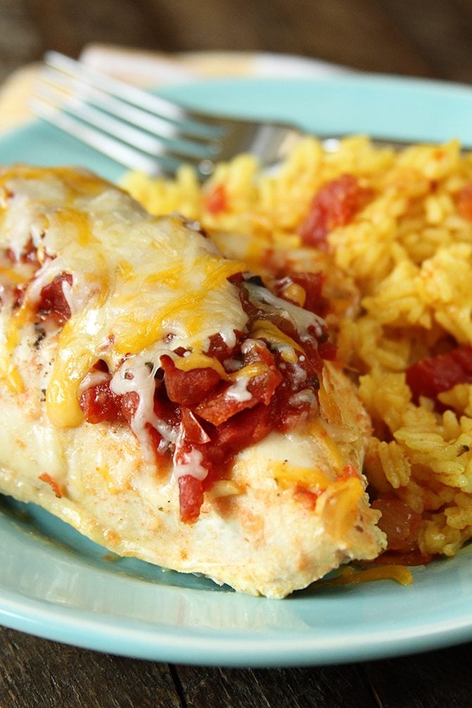 This Cheesy Salsa Chicken and Rice is the perfect one-dish meal. Prep and clean-up are a cinch and the flavors are amazing! 