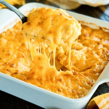 Cheese pull of Classic Baked Macaroni and Cheese.