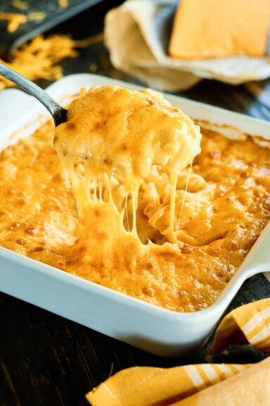 Cheese pull of Classic Baked Macaroni and Cheese.