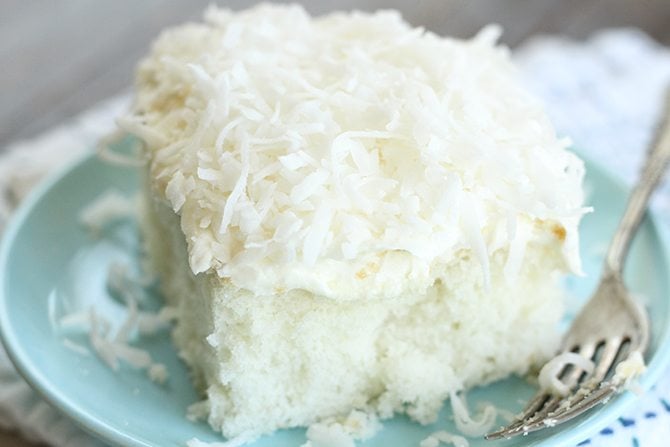  This Dreamy Coconut Sheet Cake starts out with a boxed cake mix but turns into something magical! 