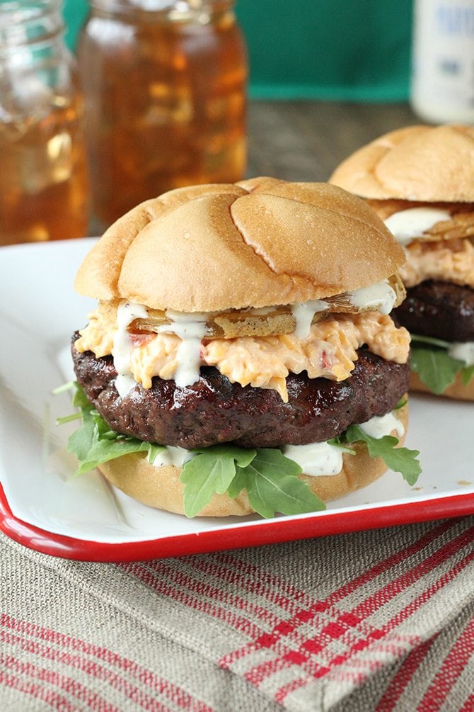 Put a little South in your mouth with this burger topped with pimiento cheese, fried green tomatoes, and Alabama White BBQ Sauce! 