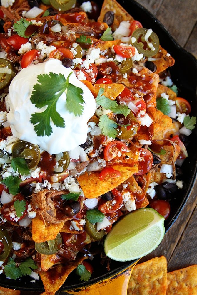 The Slow Cooker does all the hard work with these amazingly delicious LOADED Brisket Nachos! 