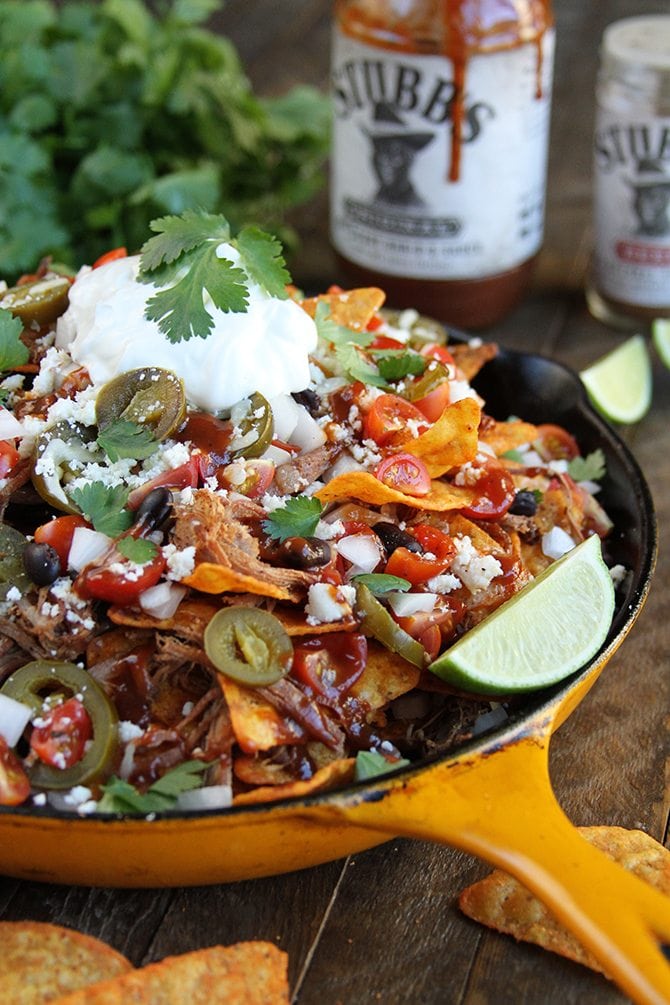The Slow Cooker does all the hard work with these amazingly delicious LOADED Brisket Nachos! 