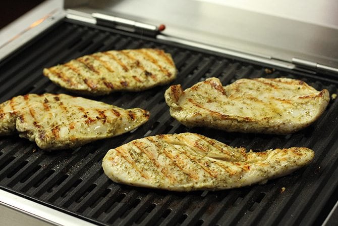 Six simple ingredients are all you need to make this jazzed up, lightened up Grilled Chicken Parmesan!  