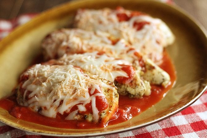 Six simple ingredients are all you need to make this jazzed up, lightened up Grilled Chicken Parmesan!  