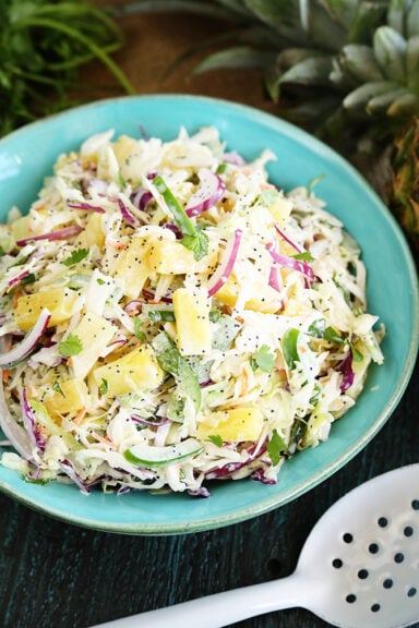 Pineapple slaw in serving bowl closer photo