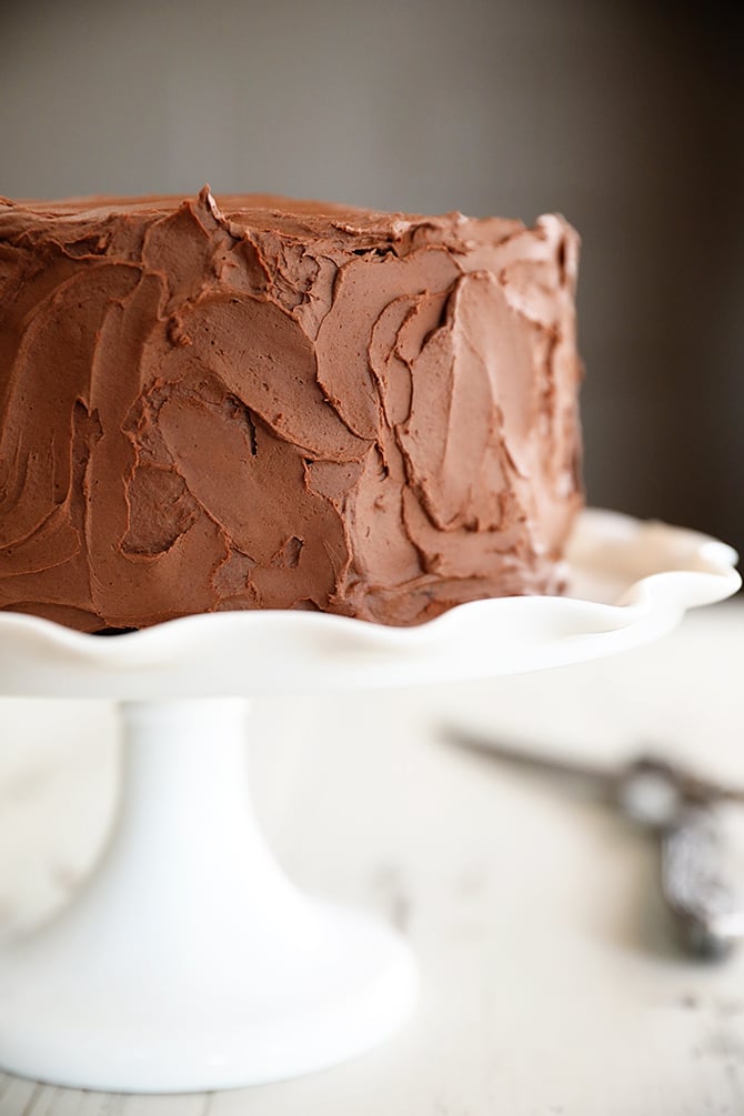Triple Chocolate Mousse Cake on cake stand