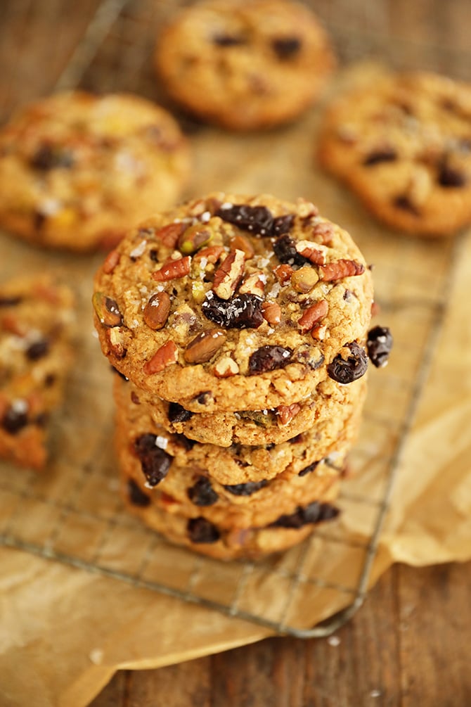 Stack of Chocolate, Cherry, Pistachio, Pecan Cookies on wire rack