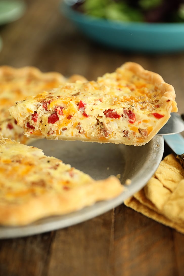 Sideview of slice of Bacon and Pimento Cheese Quiche