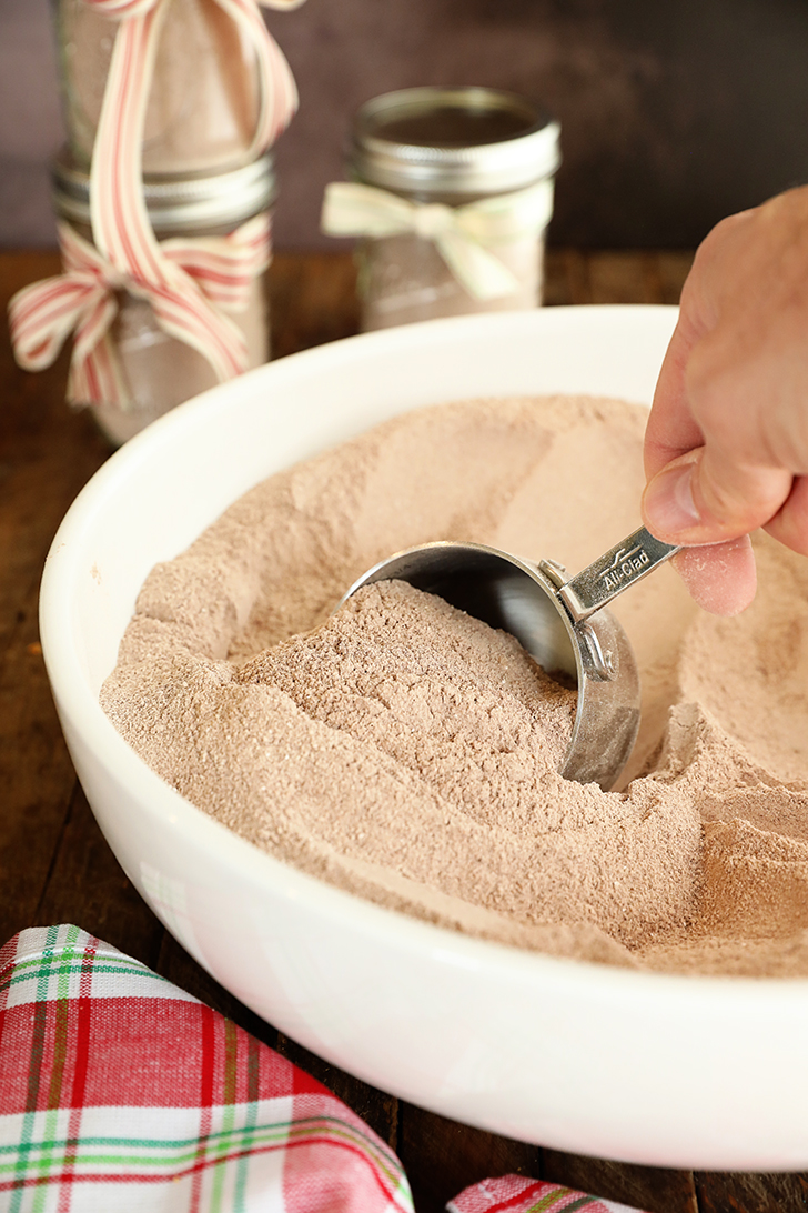 Scoop of Homemade Hot Chocolate Mix in bowl.