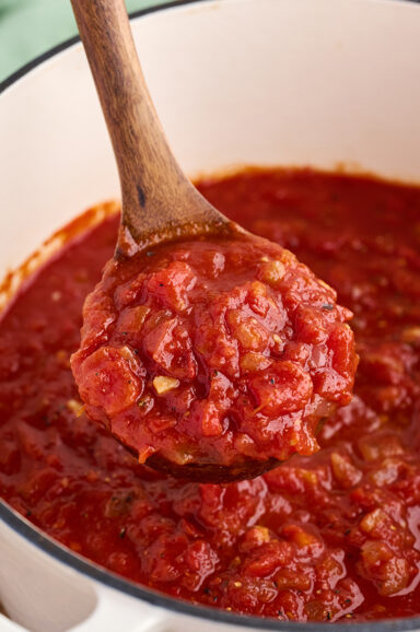 Scoopful of Homemade Marinara Sauce.