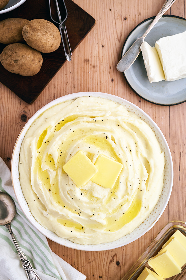 Overhead view of Cream Cheese Mashed Potatoes in bowl.