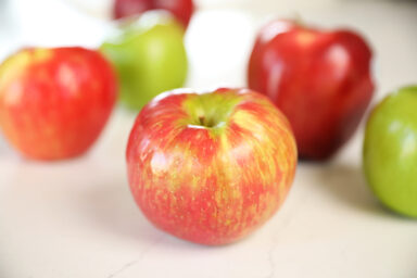 Different Apples on counter.