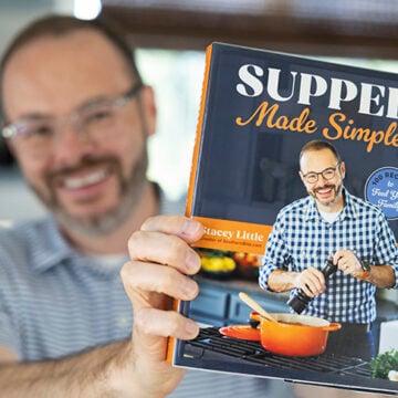 Stacey holding the cookbook.